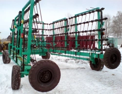 Universal soil cultivating machine with heavy tooth-spring harrows UPA-BZP-18