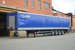 Semi-trailer of cargo model Tonar 97463 with axles of TONAR models: 90422, 90424, 90431.