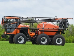 Self-propelled sprayer-spreader TUMAN-3, complete with replaceable technological equipment (boom sprayer T