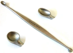 CILITA surgical instruments with cutting and percussive sharp (cutting) edge: Bone spoons.