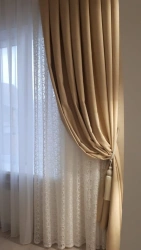 Curtains (including drapes) and internal curtains; lambrequins and bedspreads: knitted, machine and hand knitted, of cotton yarn