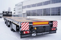 Semitrailer Tverstroimash 993941 modification 0021 variant platform with fittings, with attached ladders