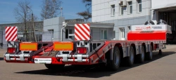 Semitrailer Tverstroimash 993941 modification 0022 - platform with ramps and racks