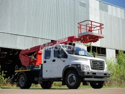 Self-propelled boom lift with working platform PSS-131.18E with all-metal box section boom on chassis base