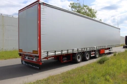 Semitrailer-platform tilt-type three-axle trailer, modification FSA-453T