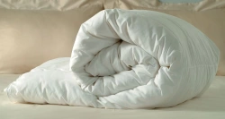 Quilted blankets for adults made of cotton, mixed and synthetic fabrics with fibre fillings