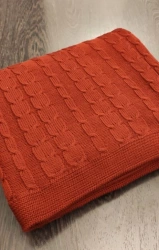 Plaids knitted by machine from natural, blended, synthetic yarns. Volume knitting with relief pattern.