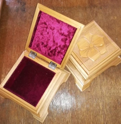 Wooden carved casket with velvet trimming